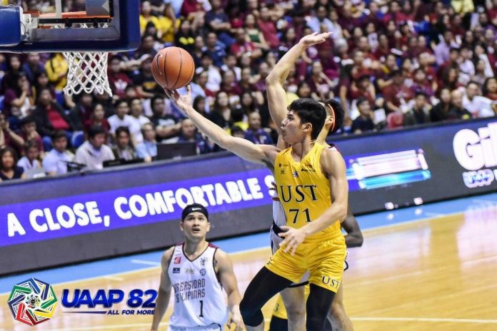 Crispin Cansino University of Santo Tomas Growling Tigers’ Crispin Cansino goes for an inside hit. UAAP PHOTO
