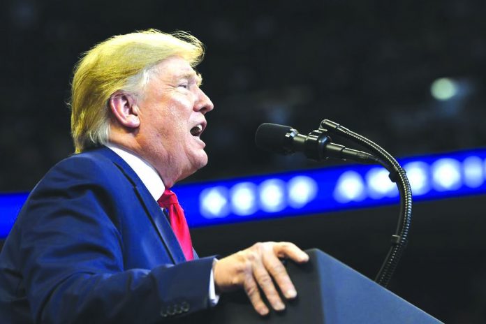 United States President Donald Trump speaks at a campaign rally in Sunrise, Florida, USA on Nov. 26, 2019. AP