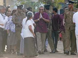 Presidential election candidate and former wartime defense chief Gotabaya Rajapaksa leaves after casting his vote during the presidential poll in Colombo, Sri Lanka on Nov. 16. REUTERS/DINUKA LIYANAWATTE