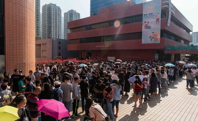 Hong Kong voters out for polls after months of unrest Long queues are seen at polling stations in Hong Kong, China on Sunday. A record 4.1-million people have registered to vote – over half of this city’s population of 7.4 million. GETTY IMAGES