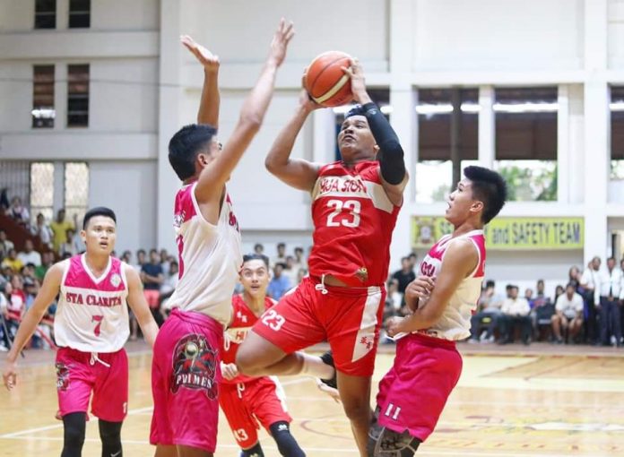 Hua Siong College of Iloilo Red Phoenix’s Reneil Gamboa Hua Siong College of Iloilo Red Phoenix’s Reneil Gamboa is forced to a tough basket by the defense. PHOTO COURTESY OF WINMEL LEE