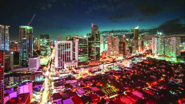 Timelapse Makati Skyline, Metro Manila - Philippines Philippines’ low inflation and South East Asian (SEA) games-related spending are seen to boost domestic growth to a six-percent expansion this 2019. BLOOMBERG