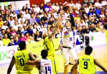 Magnolia downs KaTropa in PBA Magnolia Hotshots’ Jean Marc Pingris attempts a basket against TNT KaTropa’s KJ McDaniels. PBA PHOTO