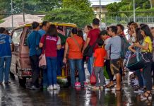 DOTR HALTS 2020 JEEPNEY PHASEOUT Passengers wait for their turn to board this jeepney in Barangay Buhang, Jaro, Iloilo City. The jeepney is the core of Philippine public transport. It started as remodeled army vehicles left behind by US forces after World War II. IAN PAUL CORDERO/PN