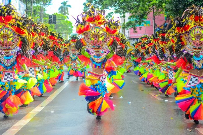 MassKara Festival Street and Arena Dance Competition pushes through the unsparing rain.