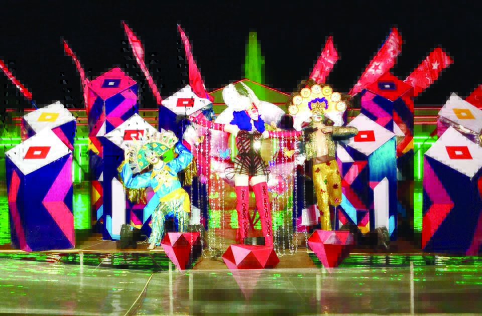 This trio stand atop an elevated platform on the New Government Center fountain area, surrounded by myriad colorful geometric obelisks and unwavering red flags. RJ LACSON VIA FACEBOOK