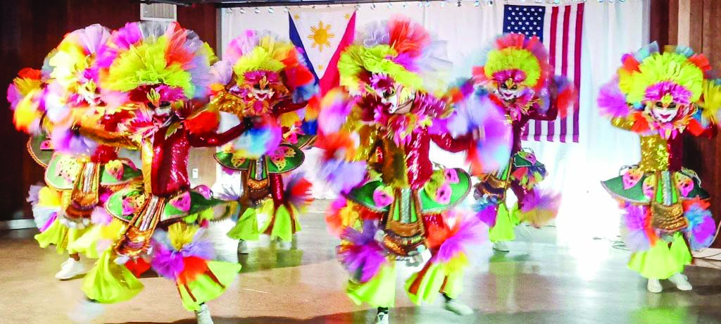 For the first time, the MassKara dance team shows off their colorful costumes at the San Francisco Filipino Cultural Center in San Francisco, California on July 27, 2019 as part of Bacolod City’s trade and tourism mission to United States. BACOLOD CITY PIO