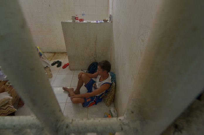 Village councilman Nelson Solas, 46, is now detained in the lockup cell of the municipal police station of Sta. Barbara, Iloilo. Police caught him after he sold suspected shabu to a poseur-buyer in entrapment operation on All Saints’ Day. IAN PAUL CORDERO/PN
