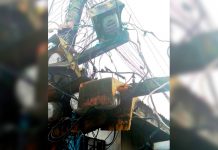 NO BUSINESS PERMIT: City govāt to auction P90-M PECO assets These dangling electricity meters of Panay Electric Co. in Iloilo City are in danger of falling. Mayor Jerry TreƱas says the safety of the people of Iloilo City is paramount.