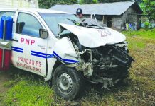 2 cops hurt in road crash Heavy damage is seen in the front portion of this patrol car of the Pandan municipal police station. POLICE CAPTAIN BRYAN ALAMO