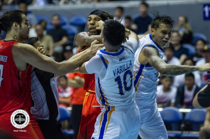 Paul Varilla NLEX Road Warriors’ Paul Varilla lands a punch on NorthPort Batang Pier’s import Michael Qualls while NLEX’s John Paul Erram hit him at the back of the neck. Tiebreaker Times Photo