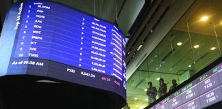Philippine stock exchange index closed the week at 7,977.12 points after briefly touching the 8,000-point level. AFP