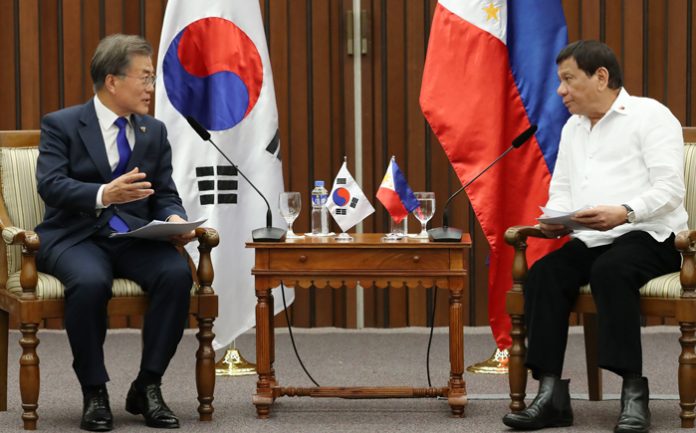President Moon Jae-in President Moon Jae-in (left) attends summit talks with Philippine President Rodrigo Duterte on Nov. 13 at the Philippine International Convention Center in Manila.
