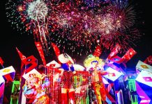 RJ Lacson’s art installation depicts three revelers, each donning a different ornate festival-inspired getup – but all brandishing iconic carnivalesque masks. PHOTO COURTESY OF RJ LACSON