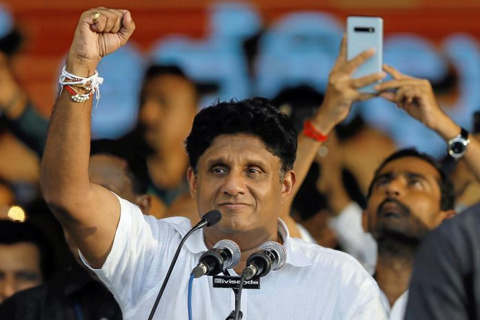 Sajith Premadasa Sajith Premadasa, Housing Minister and the presidential candidate of the United National Party, gestures at his supporters during his first election campaign rally in Colombo, Sri Lanka on Oct. 10. REUTERS/DINUKA LIYANAWATTE