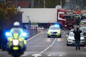 Second man charged over UK truck deaths Police move the lorry container where bodies were discovered in Grays, Essex, Britain on Oct. 23. REUTERS/HANNAH MCKAY