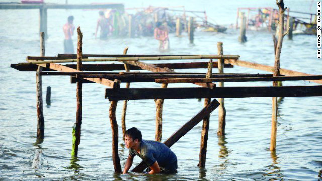 Tacloban, Leyte after Yolanda A man reconstructs his home in Tacloban, Leyte after Yolanda, one of the most powerful storms on record, hit the Philippines in November 2013, claiming lives and leaving a total damage of P86.6 billion. GETTY IMAGES
