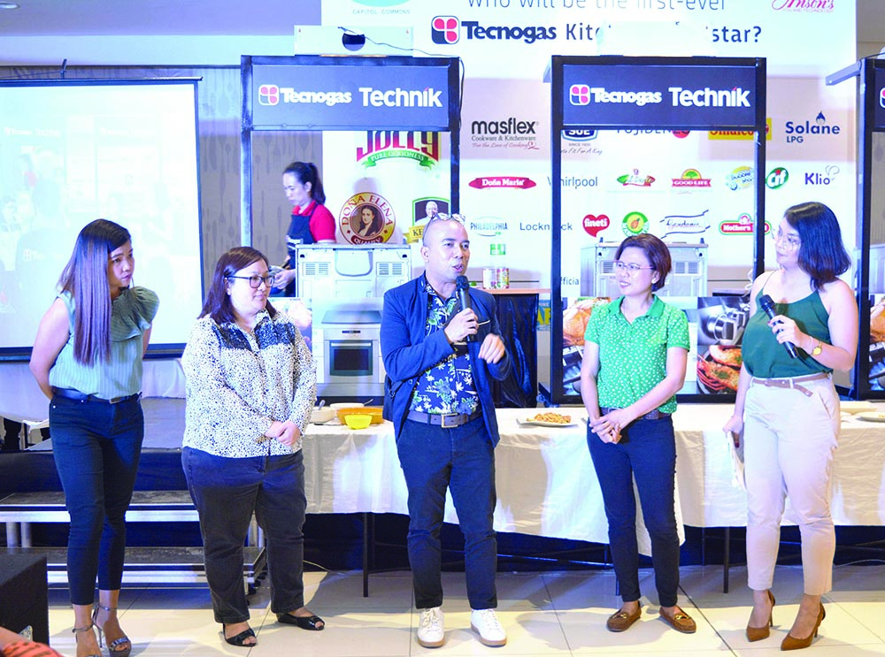 Event hosts with the competition judges