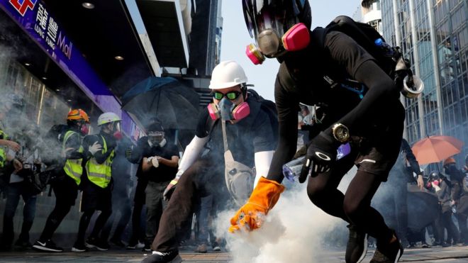 Trump signs law backing HK protesters An anti-government protester holds a tear gas canister during a protest in Hong Kong, China on Oct. 20. REUTERS/TYRONE SIU/FILE PHOTO
