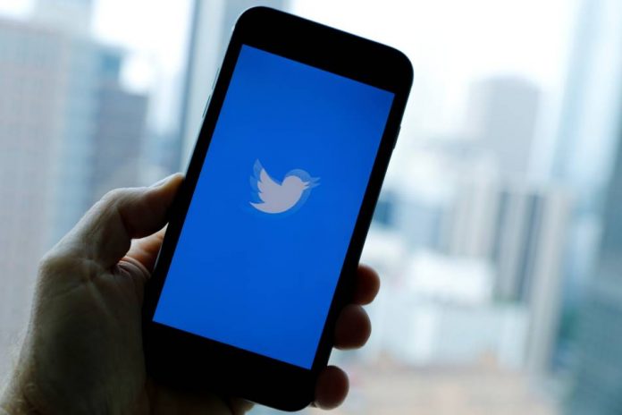 Twitter The Twitter App loads on an iPhone in this photograph taken in Los Angeles, California, United States. Spying allegations from former Twitter employees for Saudi Arabia underscored the risks for Silicon Valley firms holding sensitive data which make the platforms ripe for espionage. MIKE BLAKE/REUTERS