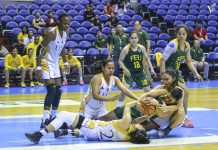 Players from the University of Santo Tomas Golden Tigresses and Far Eastern University Lady Tamaraws scramble for the loose ball. VARSITARIAN PHOTO