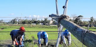 These linemen are fixing power lines destroyed during the onslaught of typhoon “Ursula” in the province of Aklan. AKELCO