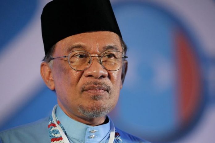 Anwar Ibrahim President of the People’s Justice Party Anwar Ibrahim reacts during their general assembly in Melaka, Malaysia in this Dec. 7, 2019 file photo. REUTERS