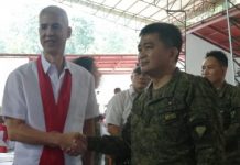 Army Colonel Inocencio Pasaporte (right), who assumed as commander of the 303rd Infantry Brigade based in Murcia, Negros Occidental on Dec. 12, meets Gov. Eugenio Jose Lacson after the change of command held at the brigade headquarters. PNA/NANETTE L. GUADALQUIVER
