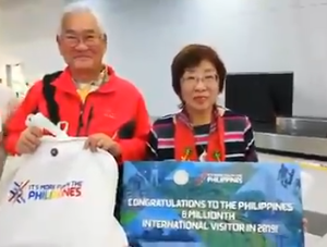 B2 - 8,000,000th tourist (banner)