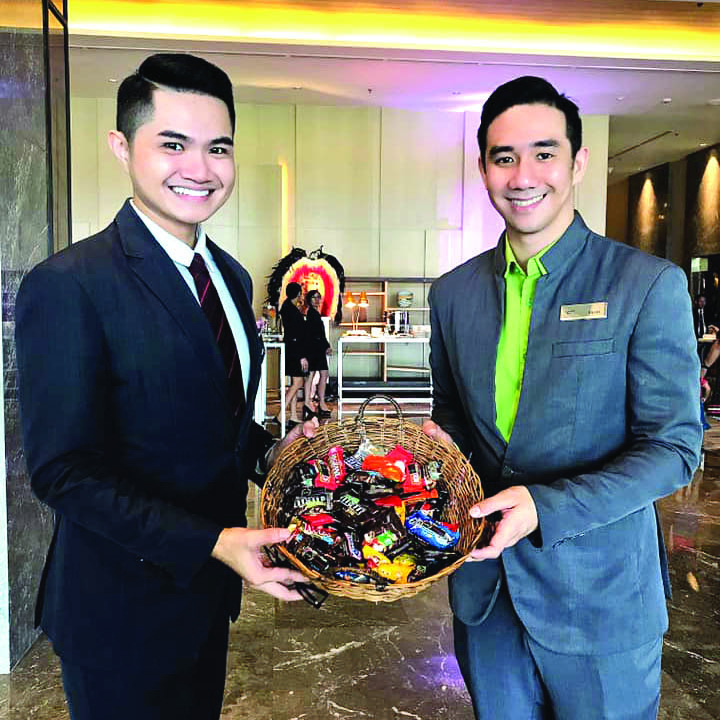 From left: Marketing Communications Manager Nico Velasquez and Front Office Agent Kevin Balomit.