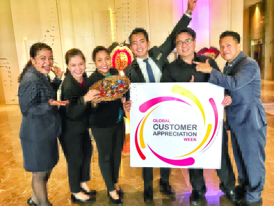 Delighting guests with sweet treats led by the Executive Committee! From left: Front Office Manager Marichu Lopez, Human Resources Manager Rosalyn Sardon , Director of Operations Maia Israel, Assistant Director Of Finance Marlon Galo, Asst. Chief Engineer Jobas Carillo, Housekeeping Manager Michael Delmar.