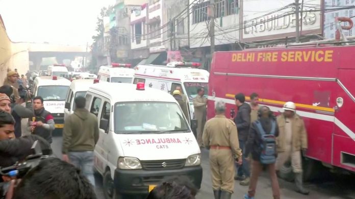 Fire at New Delhi factory kills 43 Ambulances and a firefighting vehicle responded at the scene of a deadly fire that swept through a factory where laborers were sleeping, in New Delhi, India on Dec. 8, in this still image taken from a video. ANI/VIA REUTERS TV