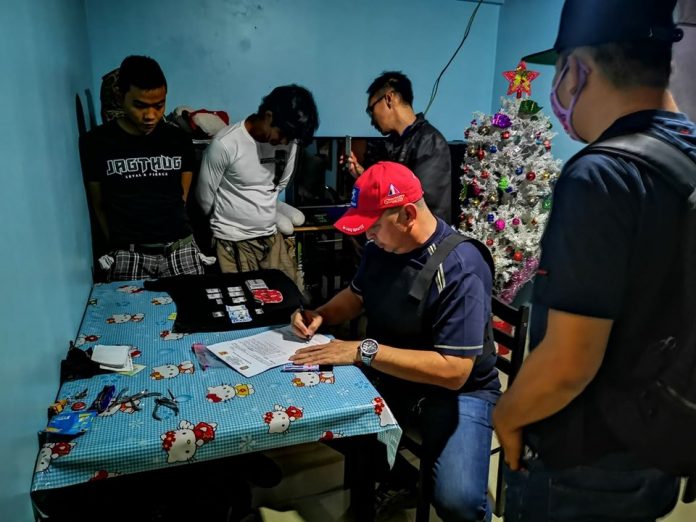 Hector Viva and Eman Jimena were nabbed in an entrapment operation in Barangay Vista Alegre, Bacolod City on Dec. 6. POLICE STATION 7/BCPO
