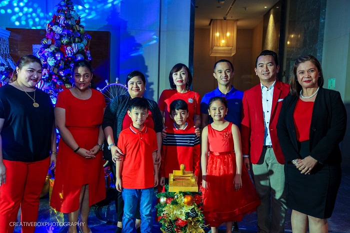 Lighting the Christmas tree, we have (starting left, from front to back) Joaquin “Jake” Fong, Napoleon “Thirdy” Jesus Tiongco III, Jelana “Nana” Dee Uy, Dir. of Sales Ms. Joy Alonte, Dir. of Operations Ms. Maia Israel, Iloilo Business Park vice president for Sales and Marketing Ms. Jennifer Fong, Club Marriott Ambassador Ms. Sheilla Golez-Tiongco, Davao-based businessman Mr. Oyo Uy, Asst. Dir. of Finance Mr. Marlon Galo, and Human Resources Manager Ms. Rosalyn Sardon.