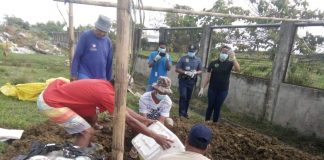 Personnel of the Iloilo Provincial Veterinary Office bury in Barangay Inaladan, Cabatuan, Iloilo boxes of imported canned pork confiscated at the Iloilo Airport. The items were from African swine fever-hit areas of Hong Kong and Singapore. African swine fever is a highly contagious viral disease that affects pigs, warthogs and boars. It is not considered a human health threat. However, humans can become carriers of the virus once tainted pork is ingested or if people get close to the infected meat. PHOTOS BY DR. DAREL TABUADA