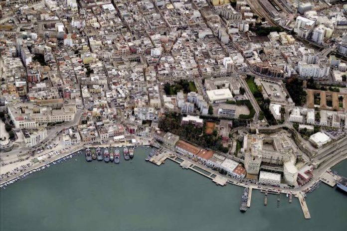 Italian city evacuates 54,000 people to defuse WW2 bomb An aerial image of the Port of Brindisi in Italy. BLOM UK VIA GETTY IMAGES