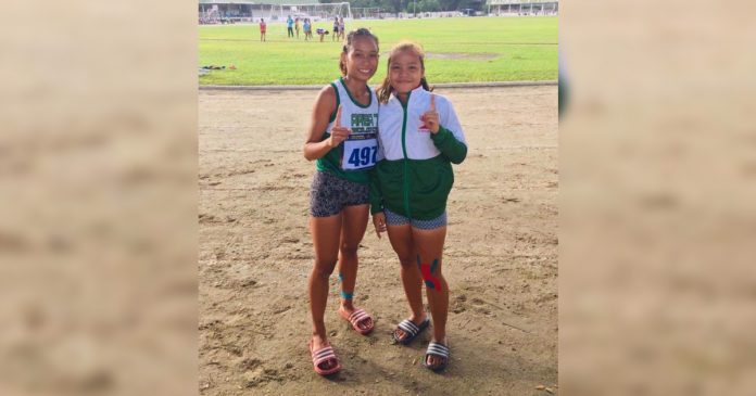 Kyla Joe Loredo and Brineth Padroncillo Cupan spearhead Area 7’s attack with gold and bronze medal finishes in the secondary girls 400-meter dash of the Negros Provincial Meet 2019. PHOTO COURTESY OFADDY ARCA