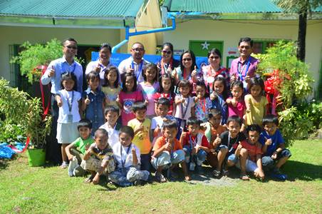 MIB turns over rainwater harvester to Sto. Angel Elementary School TURNOVER. During the ribbon cutting for the turnover of the sustainable rainwater harvester of Metro Iloilo Bulk Water to Sto. Angel Elementary School in Barangay Sto. Angel, San Miguel, Iloilo on Nov. 22, 2019, from left: Metro Iloilo Bulk Water (MIB) chief operating officer Engr. Rolixto Jodieres Jr., Principal of Sto. Angel Elementary School Sally Salaveria, Kagawad Nith Cris Alcala, MIB Human Resources manager Sheena Marie Antonio, Metro Iloilo Water District (MIWD) officer-in-charge general manager Janelle Managero, MIWD officer-in-charge Human Resources head Rafonsil Andrade, MIB Facilities and Plant Maintenance Manager Engr. Ariel Huyong and pupils of Sto. Angel Elementary School.