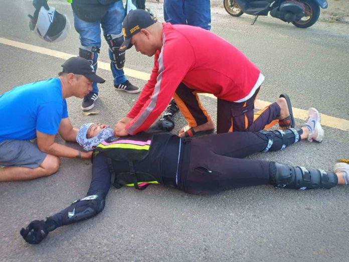Rescuers assist Antiqueña Mary Grace Pe after she figured in an accident while participating in a two-day motorcycle event in Barangay 1 Poblacion, Hinobaan, Negros Occidental on Dec. 1. The unfortunate incident has claimed her life. STEPHEN LOUIE CHECA/PN