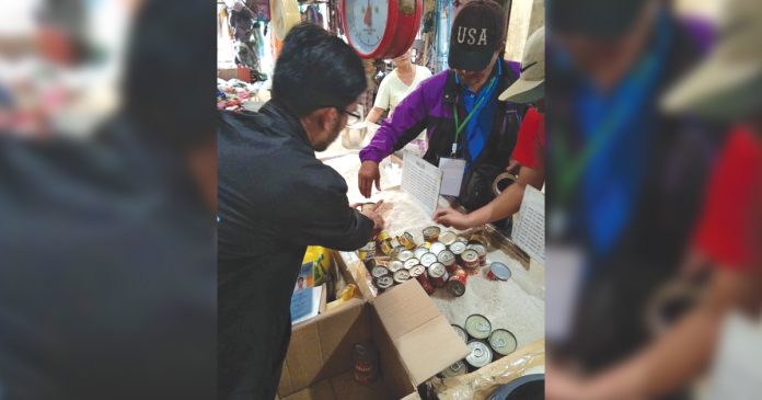 Negros Occidental Provincial African swine fever (ASF) Task Force A team of the Negros Occidental Provincial African swine fever (ASF) Task Force checks the processed foods being sold in a local supermarket on Dec. 9. Some 43 establishments have been ordered to pull out from their shelves all pork products which originated from Luzon and identified ASF-affected countries. NEGROS OCCIDENTAL PROVINCIAL ASF TASK FORCE