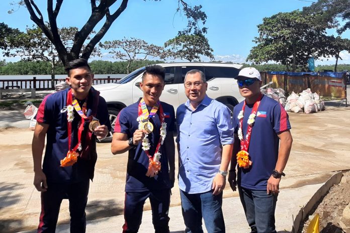 Negros boxers get hero’s welcome Rogen Ladon, who won in the men's flyweight division and James Palicte in the men's Light welterweight division, arrived yesterday in Bago City, Negros Occidental. MAE SINGUAY/PN