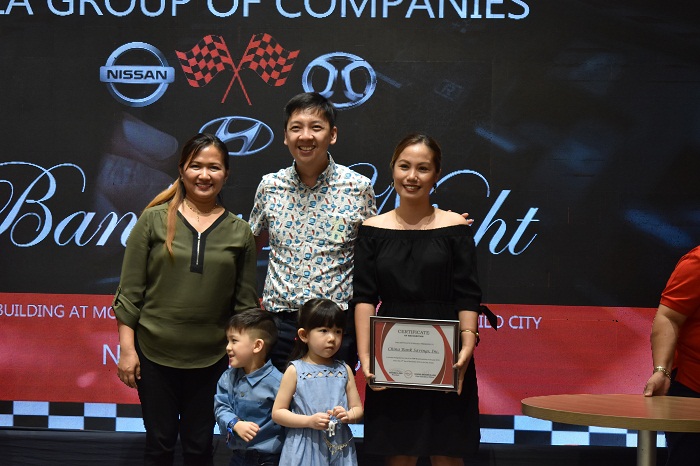 Mr. Ceazar Anthony Ang awards certificates to Nissan Iloilo’s Top 5 partner banks