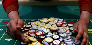 A casino dealer collects chips at a roulette table in Pasay City, Metro Manila, Philippines. Demand for office spaces in the Philippines posted a record-high of 1.7 million square meters this year, driven mainly by higher demand from the gambling industry. REUTERS/ERIK DE CASTRO