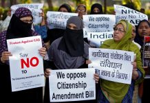 Demonstrators display placards during a protest against the Citizenship Amendment Bill, which seeks to give citizenship to religious minorities persecuted in neighboring Muslim countries, in Ahmedabad, India on Dec. 9. REUTERS/AMIT DAVE