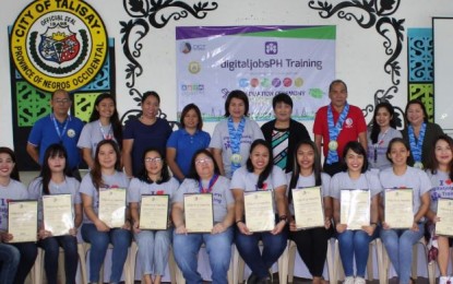 Romeo Tome Romeo Tome (standing, 3rd from right), the provincial officer of the Department of Information and Communications Technology-Negros Occidental, with the trainers, local government personnel, and scholars in Talisay City, Negros Occidental who completed the Digital Jobs PH Technical Training Project on Dec. 17. The batch comprised of 17 graduates. DICT-NEGROS OCCIDENTAL