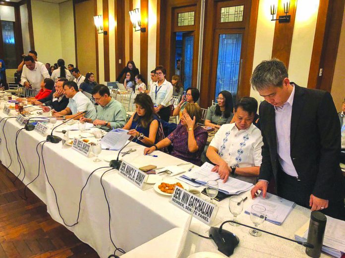 The Senate contingent, led by Senator Sonny Angara as the Senate finance committee chairman, signs the panel report on the bicam-approved P4.1-trillion 2020 national budget. OFFICE OF SEN. SHERWIN GATCHALIAN