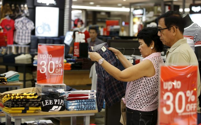 Shopping Residents shop at a mall in Las Pinas, Metro Manila. Major Philippine malls will hold a month-long nationwide sale on March 2020. REUTERS