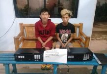 Sky Inventor (right) and Jay Rose Delprado were arrested for allegedly stealing karaoke equipment at a bar in Barangay Singcang-Airport, Bacolod City on Dec 29. POLICE STATION 8/BCPO