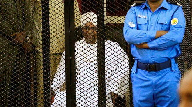 Sudan ex-leader sentenced for corruption Sudanese former president Omar al-Bashir sits inside a cage during a hearing at a court in Khartoum, Sudan on Dec. 14. REUTERS/MOHAMED NURELDIN ABDALLAH
