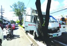 The front of this truck sustained heavy damage after crashing into a tree along General Luna Street, City Proper on Wednesday. IAN PAUL CORDERO/PN